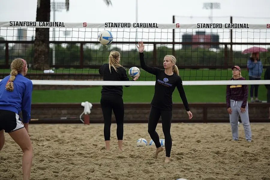 Warm-up on a beach volleyball court